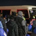 Adult and child migrants arriving at Murtala Muhammed International Airport in Lagos